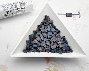 Miyuki Half Tila Beads: Matte Black AB, 5x2.3mm (7.8 GM Tube)