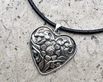Repousse Heart Necklace, Repousse Relief Design with a Heart Shape on Hand Braided Black Leather Cord with Button Clasp