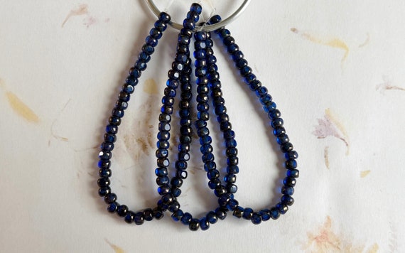 4x3mm Trica Sapphire with an Etched and Picasso Finish, 50 Beads Per Strand, 1mm Center Hole, Trica Beads