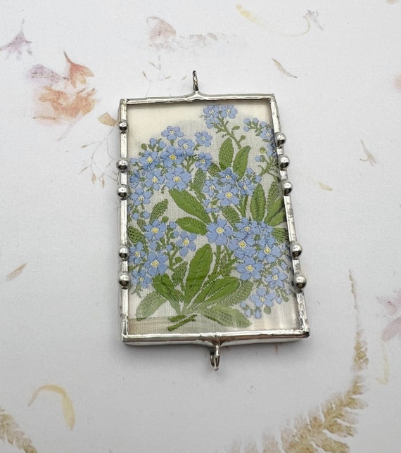 Kenistas Forget Me Not, Silk Flower Mixed Media Pendant, Two Sided Design Using the Embroidered Silk Flower and the Descriptive Back Panel