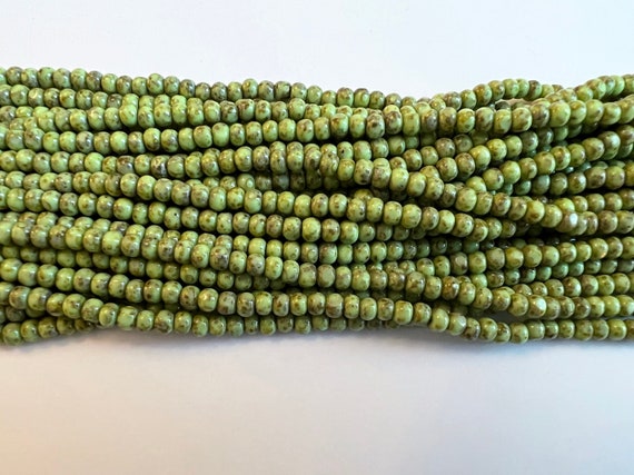 6/o Royal Jade Picasso, Three Cut Czech Glass Seed Beads, 4mm Trica Beads, 21 Inch Strand, Approximately 150 Per Strand, 13 Grams