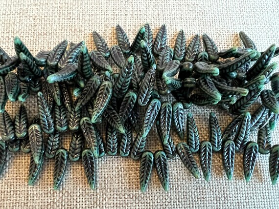 Bird Feather Beads, 17x5mm, Turquoise Green Travertine Black, 25 Beads per Strand, Pressed Czech Glass Feather Beads, Top Drill, Single Hole
