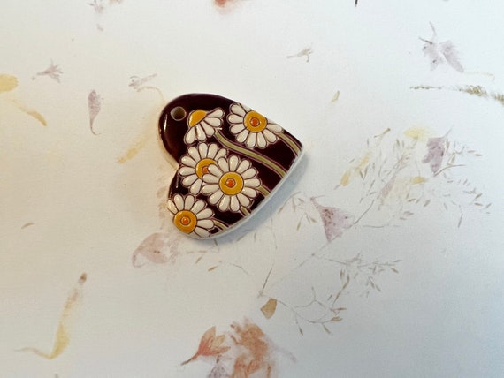 Please Don't Eat These Daisies!, Stoneware, Carved Glazed Daisy Heart Pendants, Hand Crafted by Golem Design Studio, Purple!