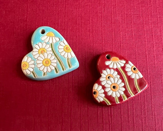 Please Don't Eat These Daisies!, Stoneware, Carved Glazed Daisy Heart Pendants, Hand Crafted by Golem Design Studio, Select Turquoise or Red