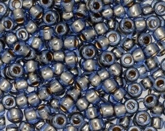 TOHO Size 6/o Round Seed Beads, Color Number 992c Gold Lined Light Montana Blue, 8 to 9 grams per 2.5 Inch Tube