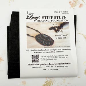 May include: Lacy's Stiff Stuff Beading Foundation sheets, 4 1/2 x 5 1/2 inches, with text that reads "The BEST stuff to bead on!" and instructions for cabochon beading, bead applique, and more. Includes a QR code.