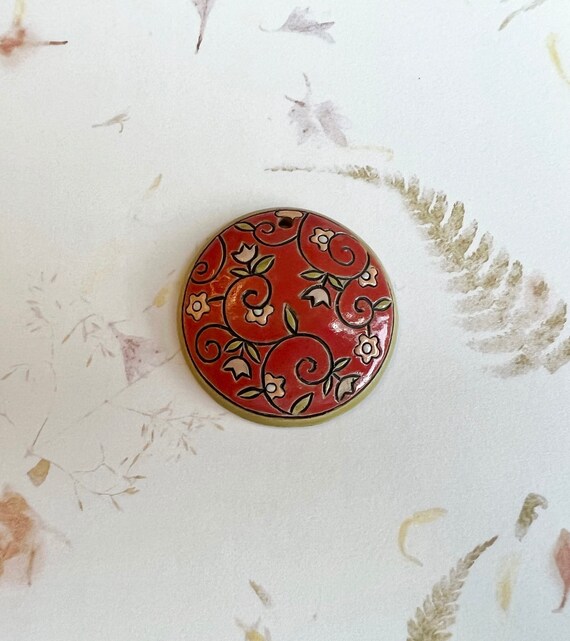 Flowers and Vines on Tuscany Red, Round Stoneware Pendant, Golem Design Studio, Glazed On Both Sides