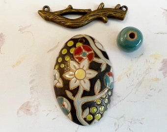 Tuscany Majolica Stoneware Pendant with Design Elements, Domed Oval Stoneware Pendant, Antique Bronze Branch Connector, Blue Round
