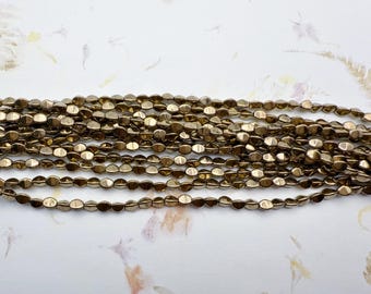 Pinch Beads, Bronze, 5x3mm Pinch Beads, 50 Pinch Beads Per Strand