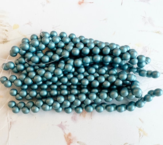 Satin Metallic Artic Blue, 6mm Top Hole Round Beads, Color Trends, 25 Beads Per Strand