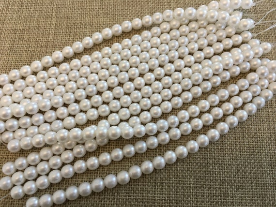 Snow 6mm Glass Pearls, 25 Pearls Per Strand, Luster Finish