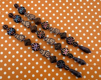 Czech Glass Bead Strand: Cats, Metallic Spiders, Autumn Tones
