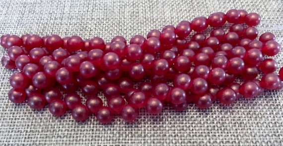 Sueded Gold Ruby, 6mm Top Hole Round Beads, Color Trends,  25 Beads Per Strand