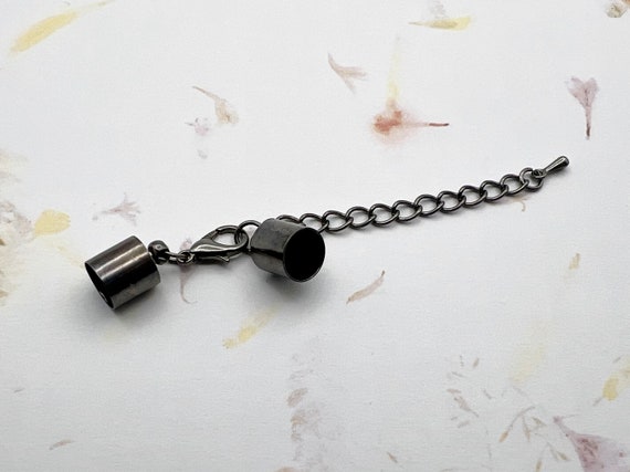 Gun Metal End Caps With Lobster Clasp And Extender, Available In 4 Sizes, 8mm, 6mm, 5mm And 4mm, Inside Diameter Is .50mm Smaller For Each