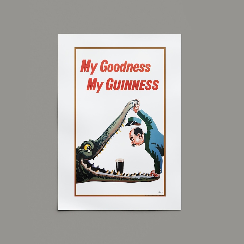 May include: Vintage Guinness advertisement featuring a cartoon illustration. A man in a blue suit is being menaced by a crocodile, with a pint of Guinness in its jaws. The text "My Goodness My Guinness" is at the top.