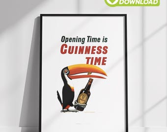 Puede incluir: Póster enmarcado con un tucán sosteniendo una botella de Guinness. El ave tiene un gran pico naranja y está sobre un fondo blanco. El texto dice "Opening Time is Guinness Time" en verde y rojo.
