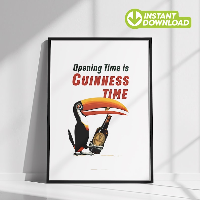 May include: Framed poster with a toucan and a Guinness bottle. The toucan has a large orange beak and is set against a white background. Text reads "Opening Time is Guinness Time" in green and red.