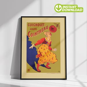 May include: Framed vintage advertisement for Guignolet Angers Cointreau. The poster features a whimsical illustration of a person in a yellow dress with cherry patterns, juggling a large cherry. The text includes "Guignolet Angers Cointreau".