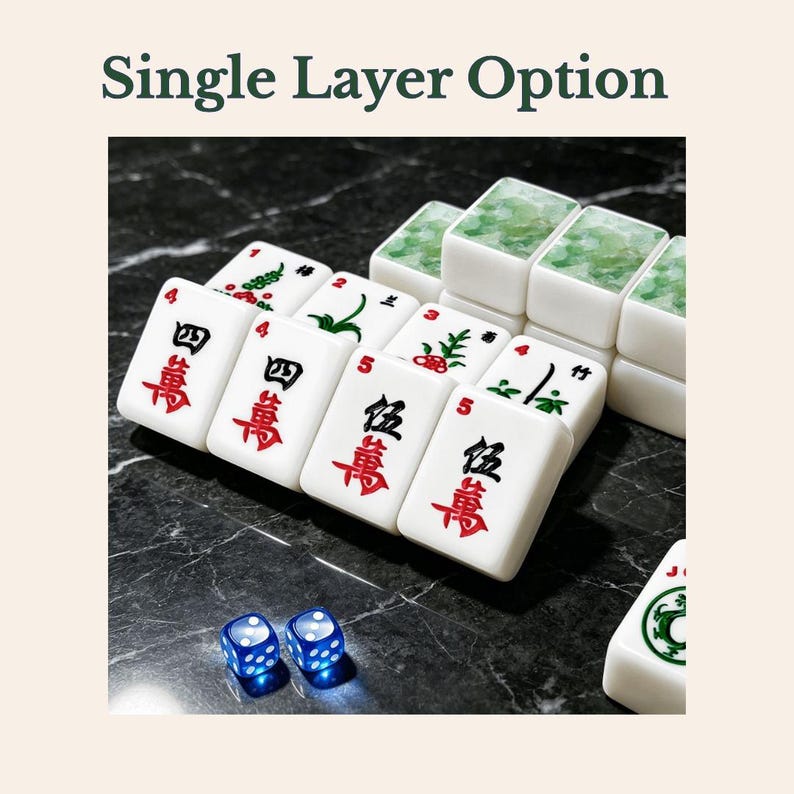 May include: A set of white Mahjong tiles with red and black Chinese characters and green floral patterns, accompanied by two translucent blue dice. The text 'Single Layer Option' is displayed above the tiles in a dark green font.