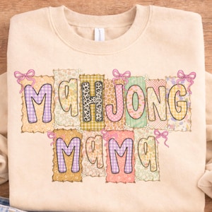 May include: A set of three ceramic mugs with a speckled, matte finish. The mugs are in shades of cream, light gray, and dark gray. Each mug has a simple, minimalist design, perfect for coffee or tea.