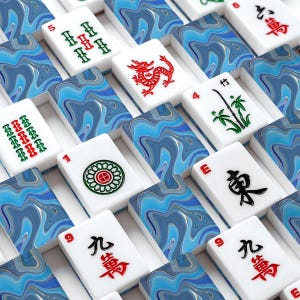 May include: A close-up shot of a Mahjong set with white tiles featuring various symbols and numbers. The tiles are arranged in a grid pattern, surrounded by blue and white marbled decorative pieces. The set includes tiles with dragons, bamboo, and other traditional designs.