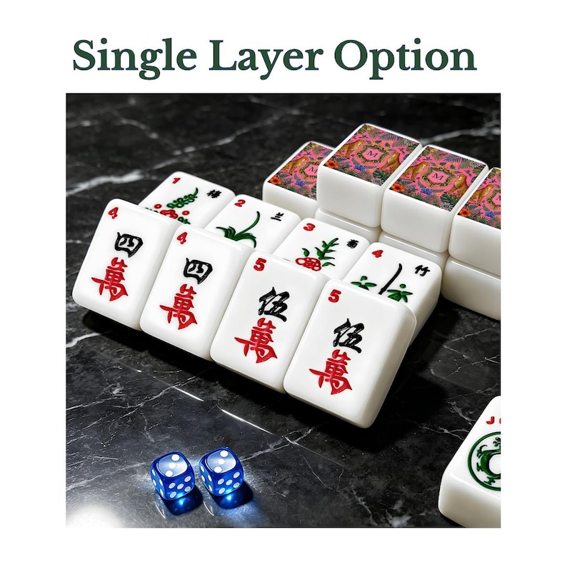 May include: A set of white Mahjong tiles with red and black Chinese characters and green bamboo symbols, alongside two translucent blue dice. Some tiles feature a decorative pink floral pattern with a central letter M. Text reads Single Layer Option.