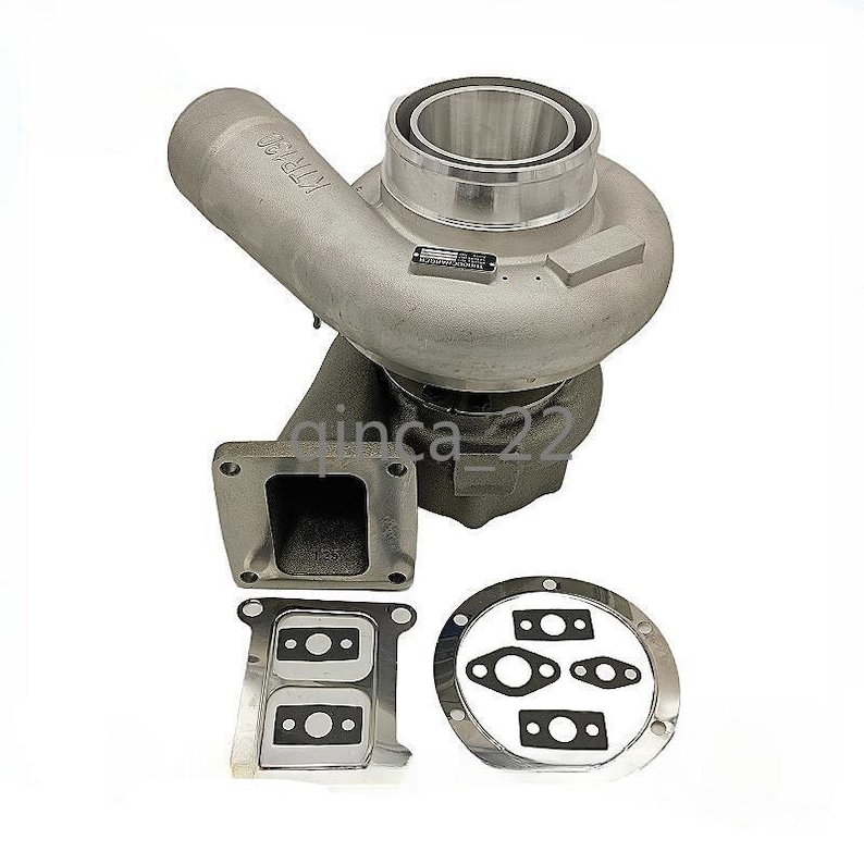 May include: A silver-colored turbocharger with a large, rounded housing and a cylindrical inlet. The image includes several related components, such as a square flange and gaskets. The turbocharger is designed for automotive applications.