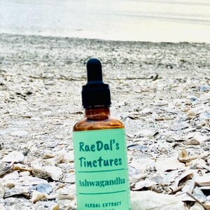 This picture showcases the Ashwagandha tincture herbal extract in the glass amber bottle that it comes in with free shipping.