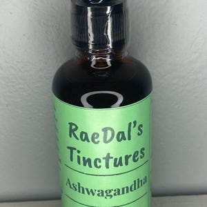 This picture showcases the Ashwagandha tincture herbal extract in the glass amber bottle that it comes in with free shipping.