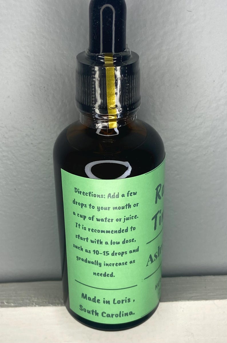 This side of the label shows the directions for using the ashwagandha tincture herbal extract. This product is made with organic ingredients and is both non-gmo and gluten-free