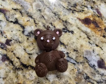 Lindo llavero de oso articulado para llaves o juguetes antiestrés
