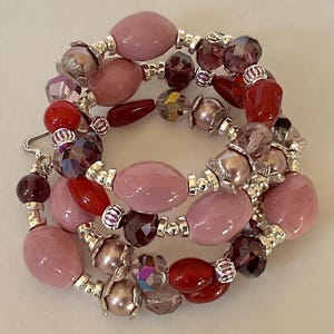 BOHO mixed bead wrap bracelet, multi colored with a heart charm.  Memory wire for easy wear. Chic and stylish, statement bling. Style trend
