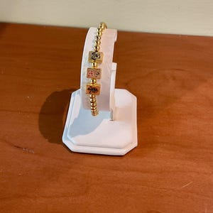 Mah Jong charm bracelet with gold tone mah jong tiles.  A fun  bracelet. Trendy, Chic and stylish. Friend gift.