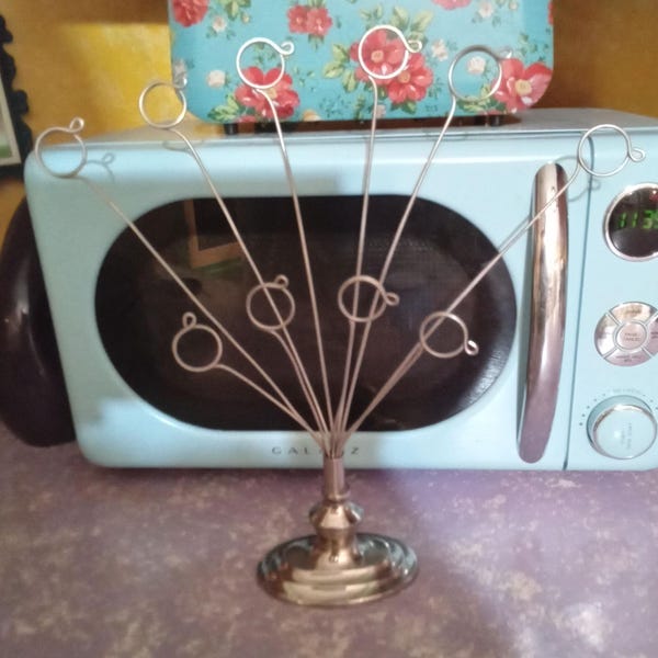 Expositor de fotos cromado ovalado (12 3/4" de alto)