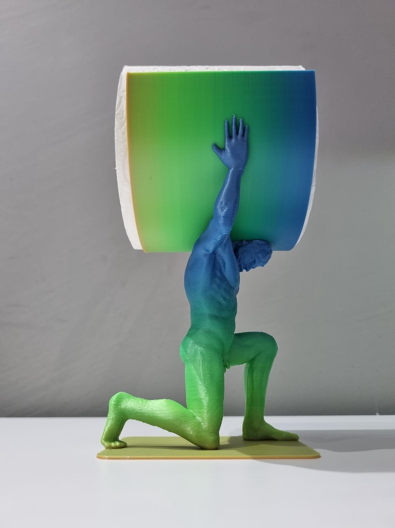 May include: A 3D printed sculpture of a person kneeling and holding a large, green, blue, and yellow gradient cylinder above their head.