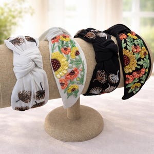 May include: A set of three ceramic mugs with a speckled, matte finish. The mugs are in shades of cream, light gray, and dark gray. Each mug has a simple, minimalist design and a rounded handle.