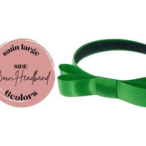 Puede incluir: Diadema de sat&eacute;n verde con un lazo lateral y una banda el&aacute;stica negra. La diadema est&aacute; etiquetada "satin large side bow headband 6 colors".