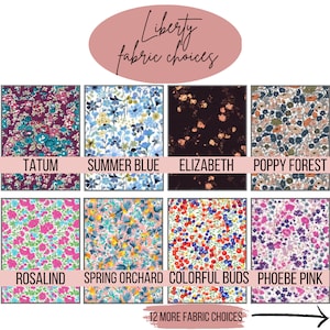 May include: A selection of Liberty fabric choices, featuring floral patterns in various colors. The image displays fabric swatches labeled with names like "Tatum," "Summer Blue," and "Elizabeth." The text "12 MORE FABRIC CHOICES" is also visible.