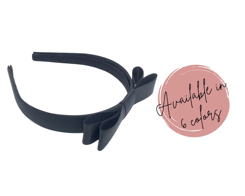 May include: Black satin headband with a large bow. Available in 6 colors.