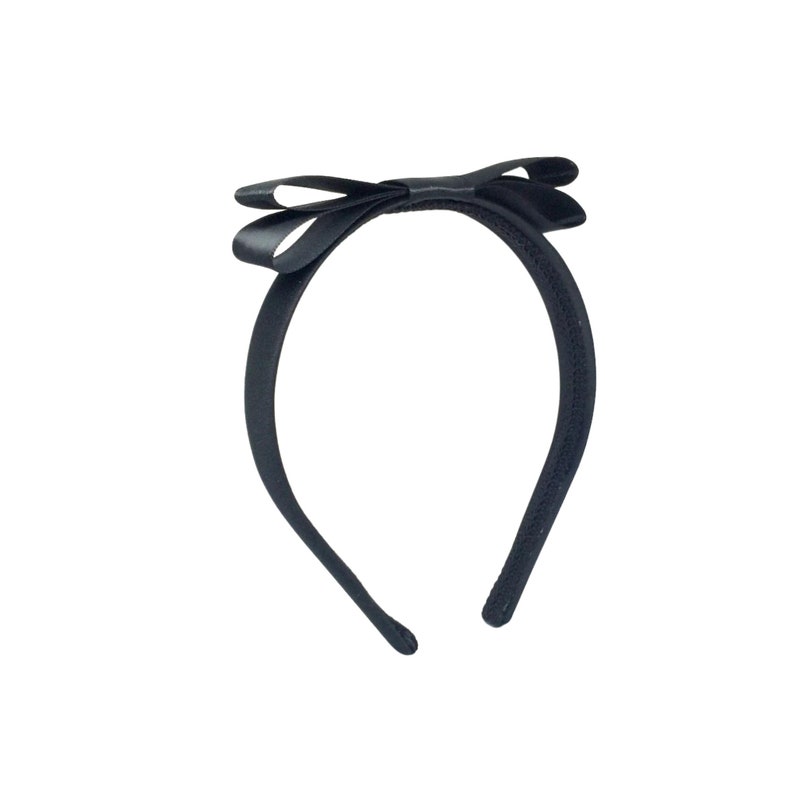 May include: A black satin headband with a large black bow.