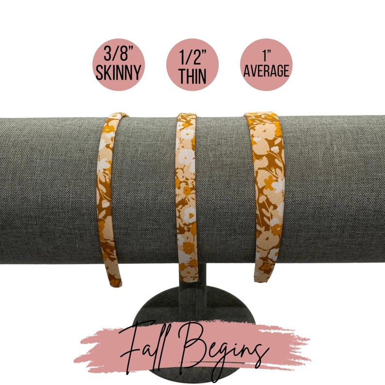 May include: Three fabric headbands in different widths, 3/8 inch skinny, 1/2 inch thin, and 1 inch average. The headbands are a floral print with a yellow and white pattern. The text "Fall Begins" is written in pink on a white background.