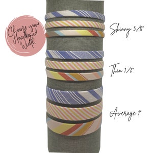 May include: A display of colorful striped headbands in various widths, including skinny 3/8", thin 1/2", and average 1". Choose your headband width.