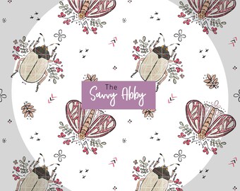 May include: A seamless pattern featuring a white background with a repeating design of pink and white butterflies, beige beetles, and floral elements. The text "The Savvy Abby" is centered in the pattern.