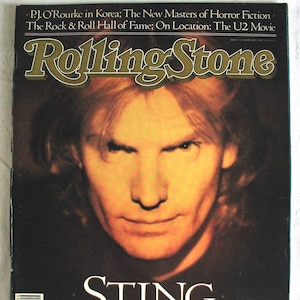 May include: A magazine cover featuring a close-up portrait of Sting, a British singer-songwriter and musician. The cover is for Rolling Stone magazine and features the text "STING" in large, bold letters and "THE ROLLING STONE INTERVIEW" in smaller letters below.