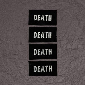 May include: Four black rectangular patches with the word "DEATH" in white, stencil-style lettering. The patches are arranged vertically against a textured, gray background. The image has a stark, minimalist aesthetic.