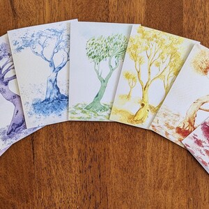 Tarjetas de regalo arcoiris - arboles coloridos