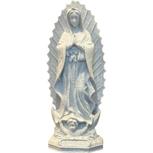 May include: A grey stone statue of the Virgin Mary with hands clasped in prayer. The statue features detailed robes and a halo-like backdrop. A small cherub is at the base of the statue.