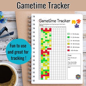 May include: A spiral-bound notebook titled "Gametime Tracker" with a colorful grid for tracking puzzle game play. The notebook includes a legend for time intervals and the text "Fun to use and great for tracking!"