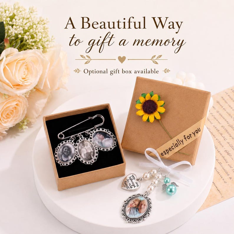 May include: A silver-toned safety pin brooch featuring three oval photo charms with ornate frames, alongside a separate charm set with a heart-shaped pendant, white pearls, a teal bead, and an oval photo charm, presented in brown gift boxes.