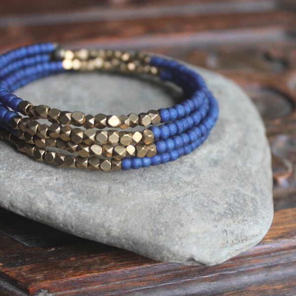 Kalimantan Stacking Memory Wire Bangle Bracelet with Monaco Blue Glass and Faceted Brass Beads - Exotic and Chic